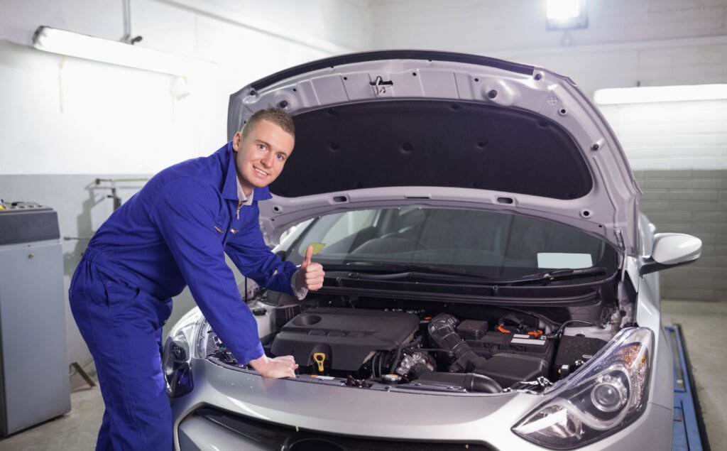 Garage HQ Mechanic with his thumb up
